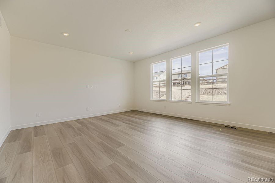 Spacious, unfurnished interior of a new home in Newlin Crossing: The Monarch Collection, Parker (Image 15).