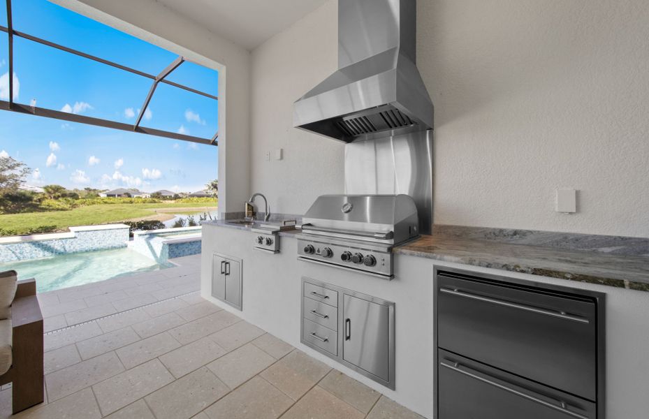 Representative furnished interior of a home built from the Layton Grande by DiVosta in BeachWalk by Manasota Key, Englewood (Image 15).