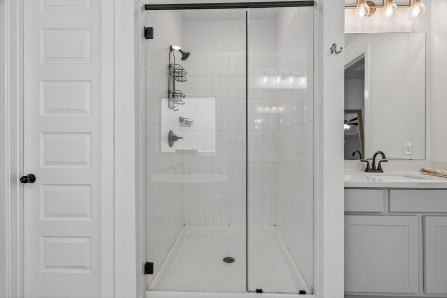 The Primary Ensuite provides a contemporary shower enclosure with glass & modern trim! 31418 Golden Cliffs Ln., Fulshear, TX 77441 The Primary Ensuite provides a contemporary shower enclosure with glass & modern trim! 31418 Golden Cliffs Ln., Fulshear, TX 77441