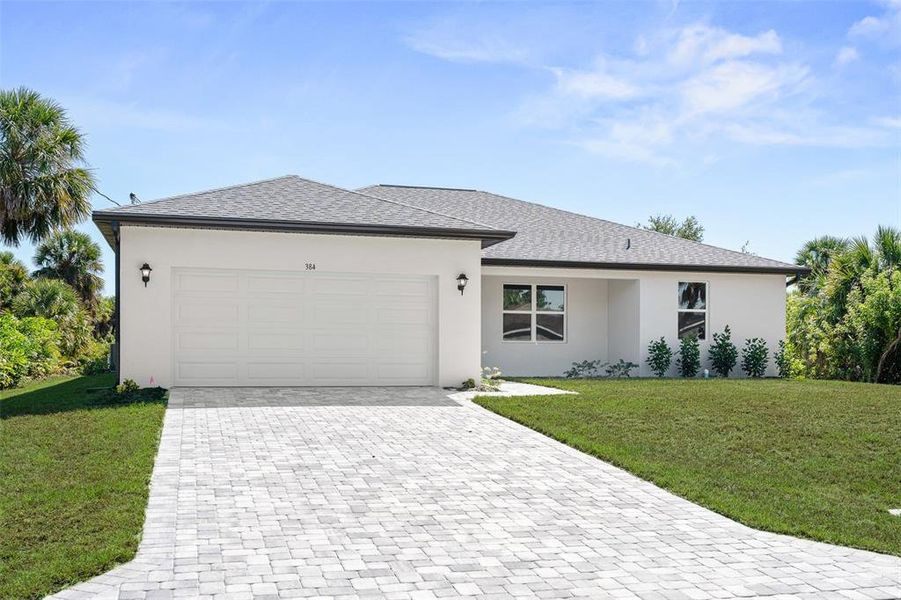 Front exterior of a new home in , Port Charlotte, FL, highlighting curb appeal (Image 1). Front exterior of a new home in , Port Charlotte, FL, highlighting curb appeal (Image 1).