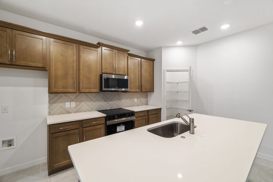 Furnished interior view inside a new home in Trinity Gardens, Deland (Image 5). Furnished interior view inside a new home in Trinity Gardens, Deland (Image 5).