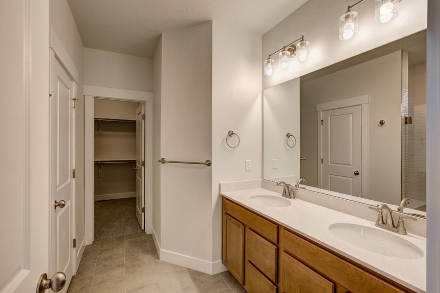 Representative furnished interior of a home built from the The Addison by Landmark Homes in The Lakes at Centerra, Loveland (Image 9). Representative furnished interior of a home built from the The Addison by Landmark Homes in The Lakes at Centerra, Loveland (Image 9).