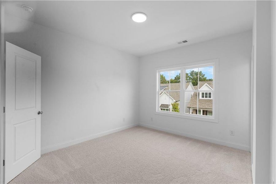 Spacious, unfurnished interior of a new home in Evanshire Townhomes, Duluth (Image 24). Spacious, unfurnished interior of a new home in Evanshire Townhomes, Duluth (Image 24).