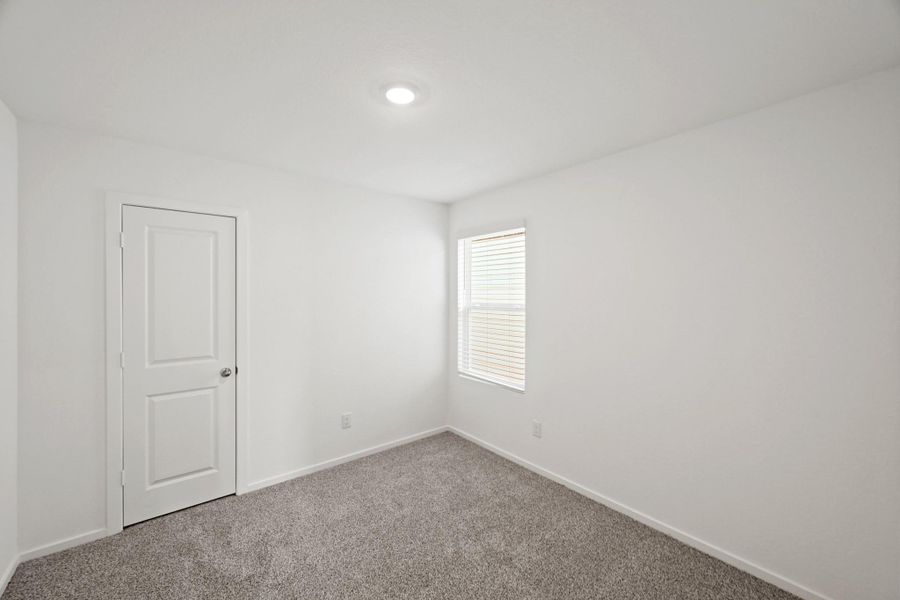 Spacious, unfurnished interior of a new home in Bridges on Lake Houston Villas, Humble (Image 14).