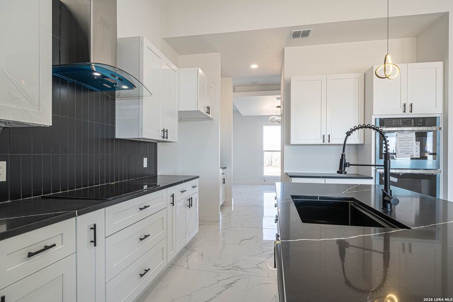 Furnished interior view inside a new home in , La Vernia (Image 11).