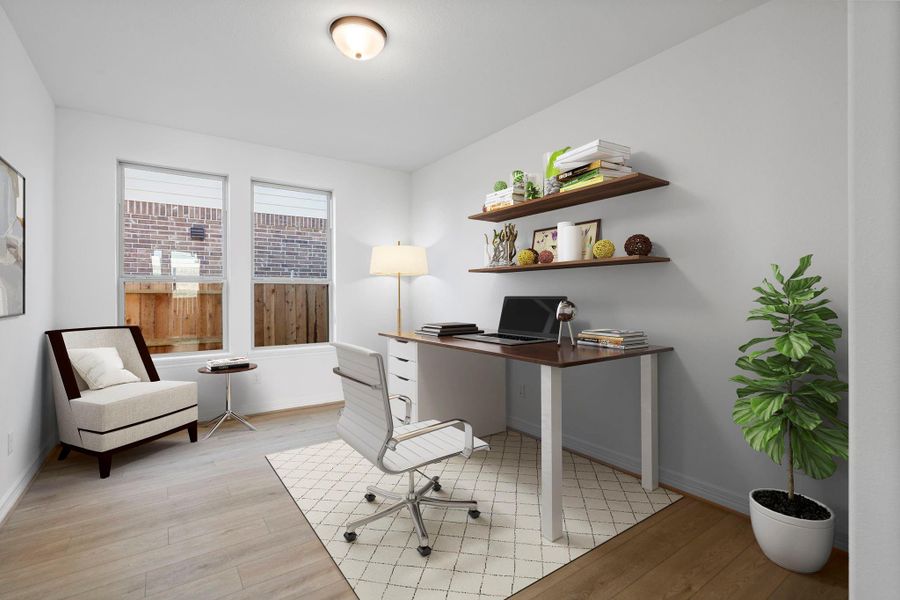 The home office features French doors, beautiful floors, large windows that give a fresh feel, this space promotes focus and creativity.