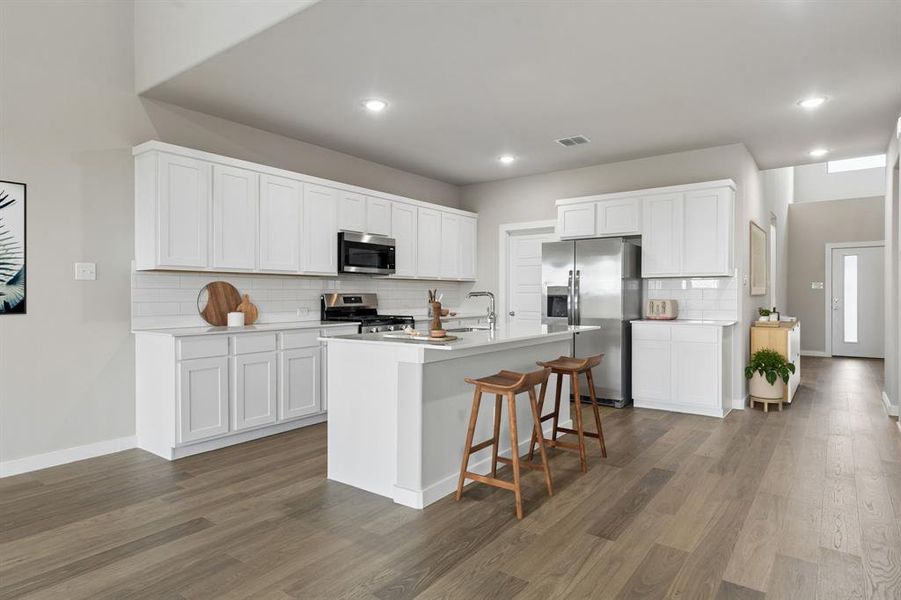 Kitchen in the Winters home plan by Trophy Signature Homes – REPRESENTATIVE PHOTO