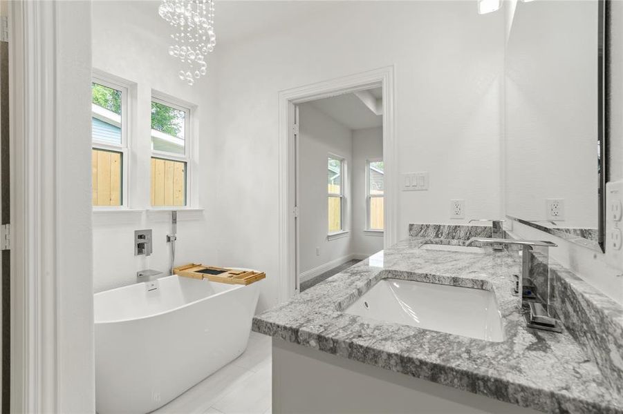Dual vanity with granite countertops and integrated sinks