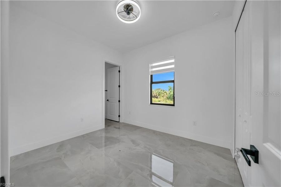 Spacious, unfurnished interior of a new home in , Lehigh Acres (Image 14).