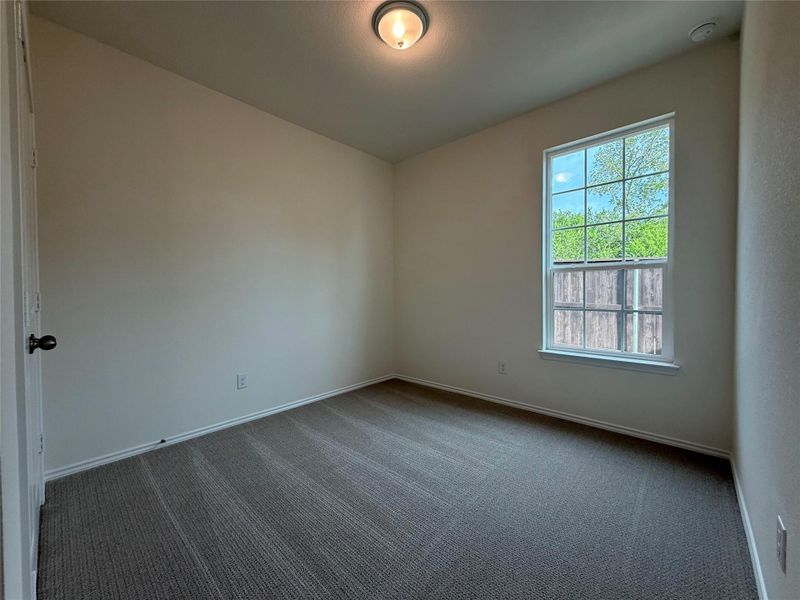 Spacious, unfurnished interior of a new home in River Bluff, Leander (Image 18).