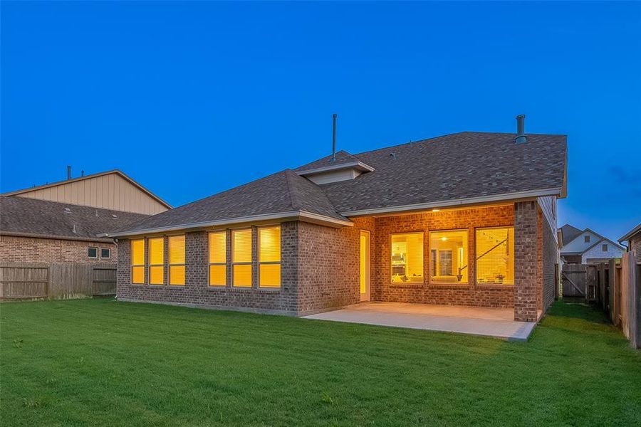 The back covered patio includes a gas line to build your outdoor kitchen. It's the perfect setting for creating unforgettable memories with friends and family for years to come.