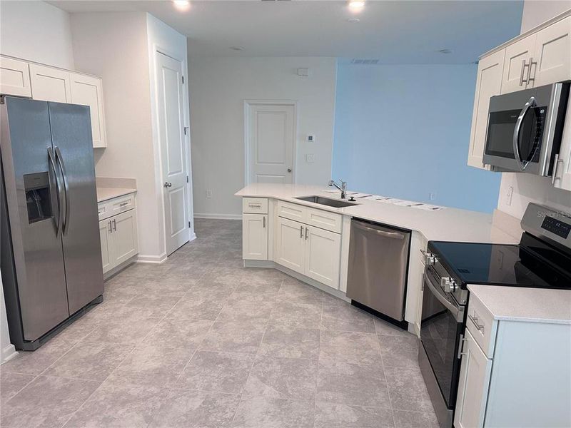 Furnished interior view inside a new home in Ranches at Lake McLeod, Eagle Lake (Image 6).