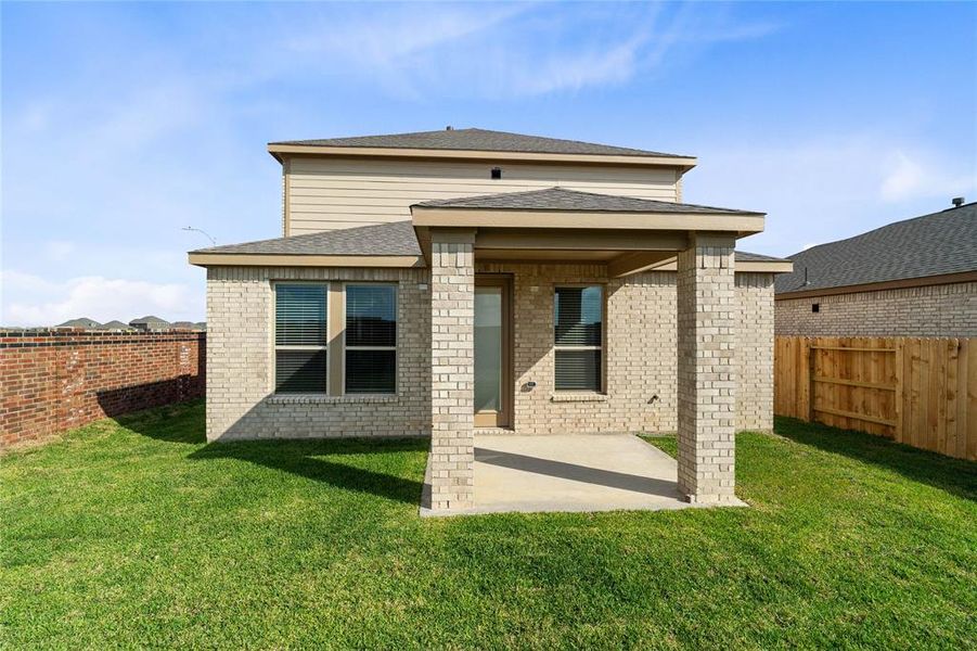 Come and see this spacious backyard with covered patio. There is plenty of room for the kids to play and adults to relax!