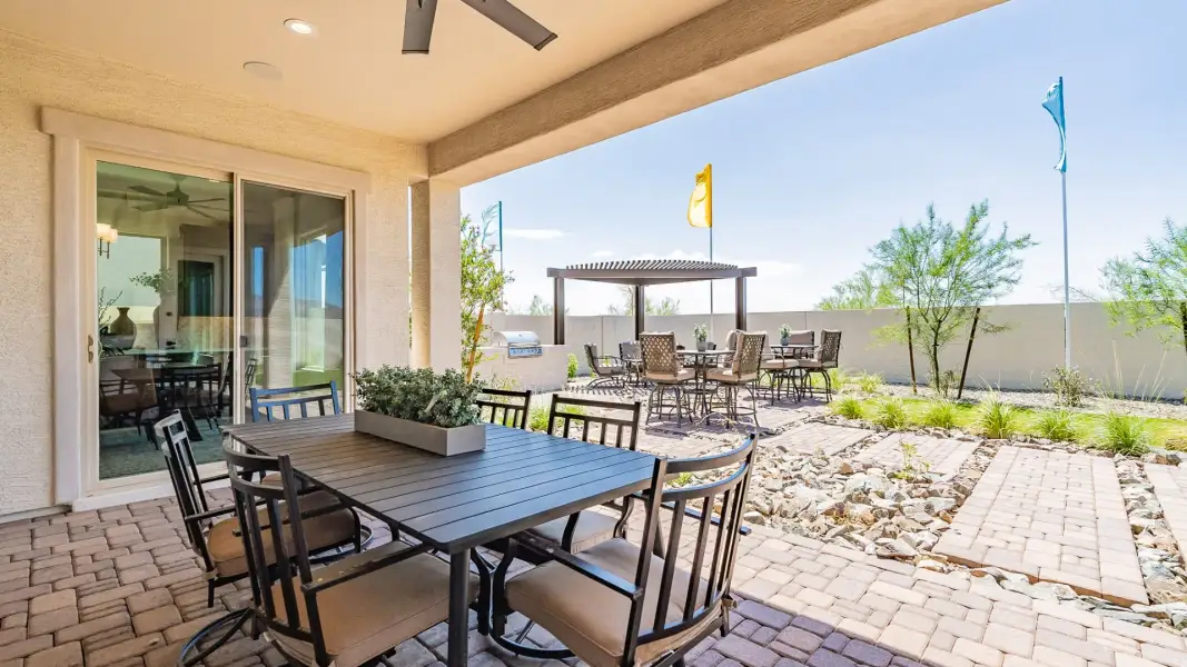 Exterior details and patio area of a home in Windrose, Waddell (Image 3).