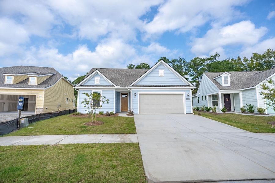 Front exterior of a new home in Del Webb Charleston at Nexton, Summerville, SC, highlighting curb appeal (Image 23). Front exterior of a new home in Del Webb Charleston at Nexton, Summerville, SC, highlighting curb appeal (Image 23).