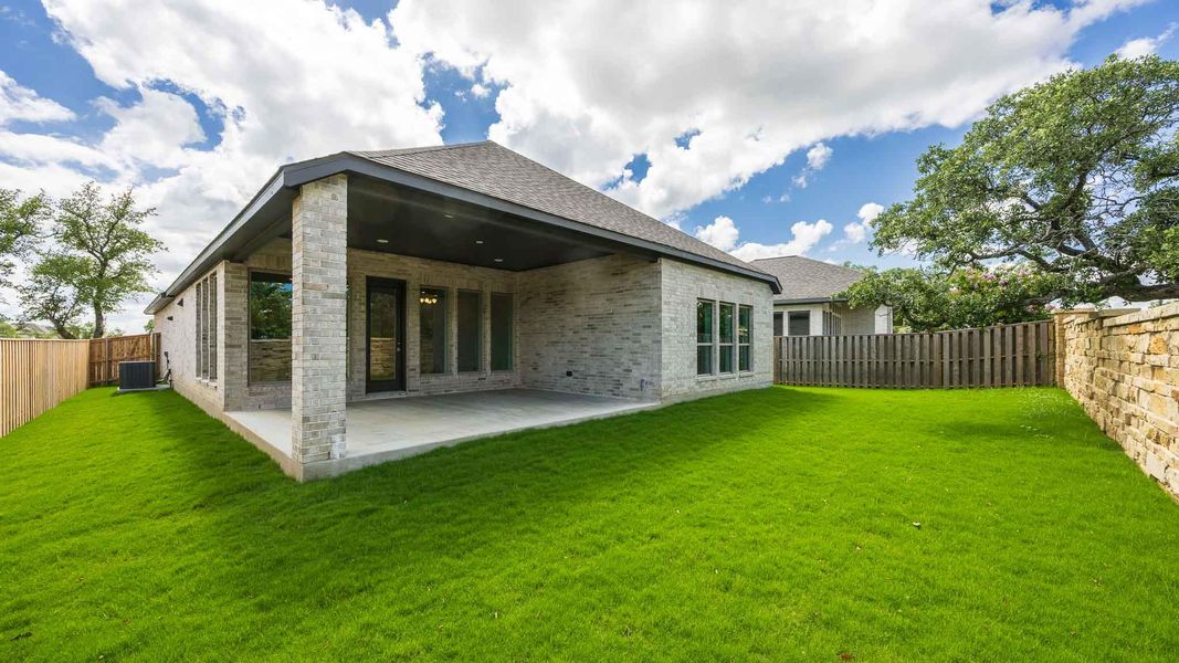 Exterior details and patio area of a home in Parmer Ranch, Georgetown (Image 3).