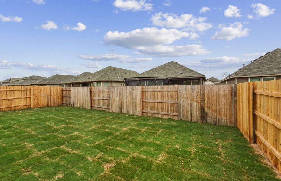 Exterior details and patio area of a home in Sunfield, Buda (Image 20).