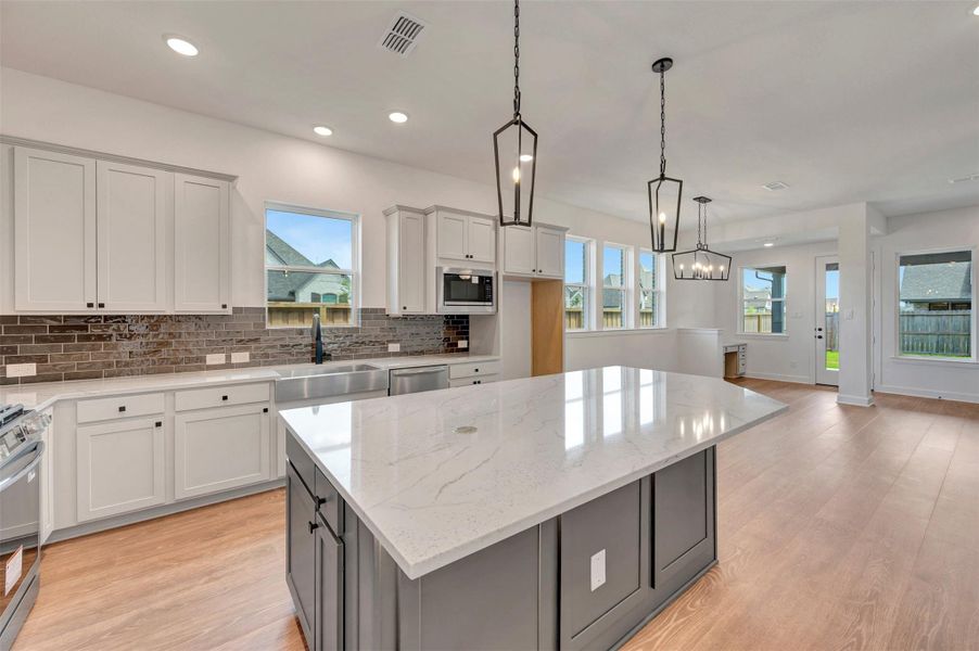Furnished interior view inside a new home in Riceland - Enclave Collection, Mont Belvieu (Image 4). Furnished interior view inside a new home in Riceland - Enclave Collection, Mont Belvieu (Image 4).