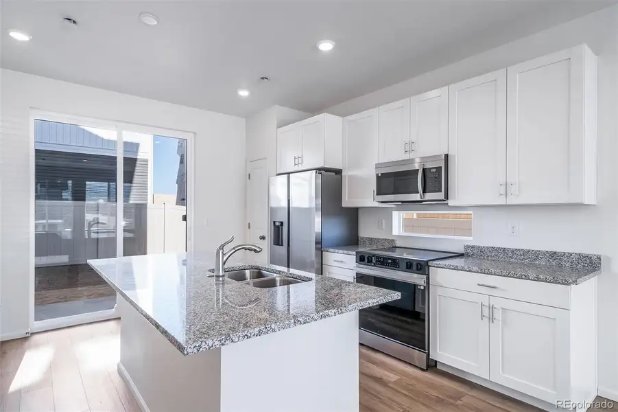 Furnished interior view inside a new home in Muegge Farms, Bennett (Image 5).