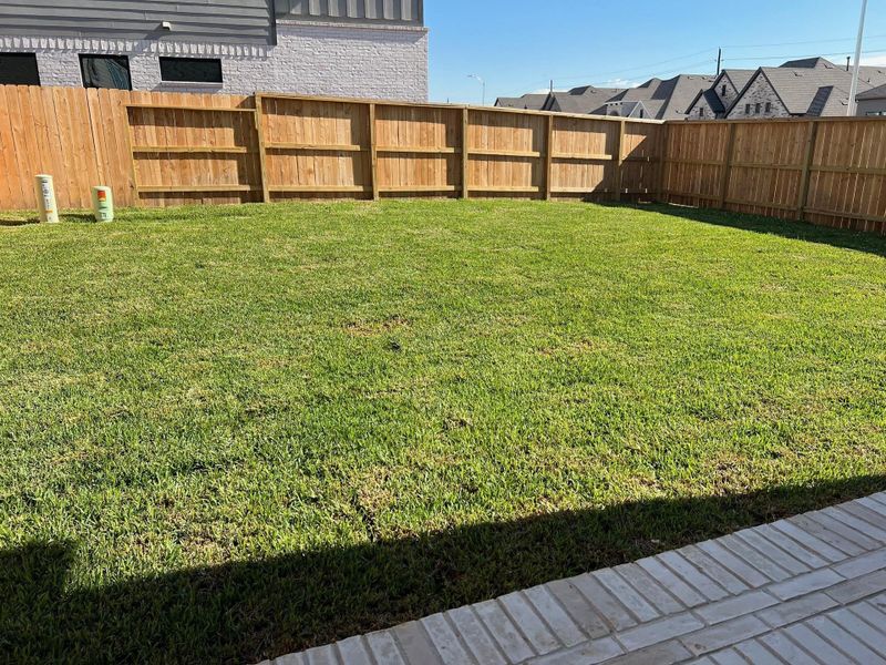 Exterior details and patio area of a home in Wood Leaf Reserve, Tomball (Image 4). Exterior details and patio area of a home in Wood Leaf Reserve, Tomball (Image 4).