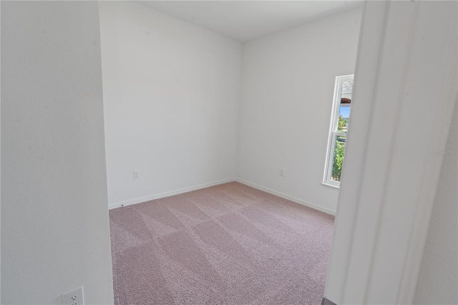 Spacious, unfurnished interior of a new home in Peach Crossings, Winter Haven (Image 10).