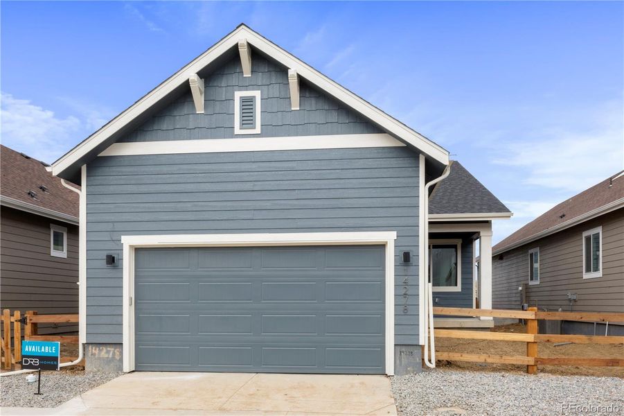Front exterior of a new home in Dillon Pointe - City, Broomfield, CO, highlighting curb appeal (Image 1).