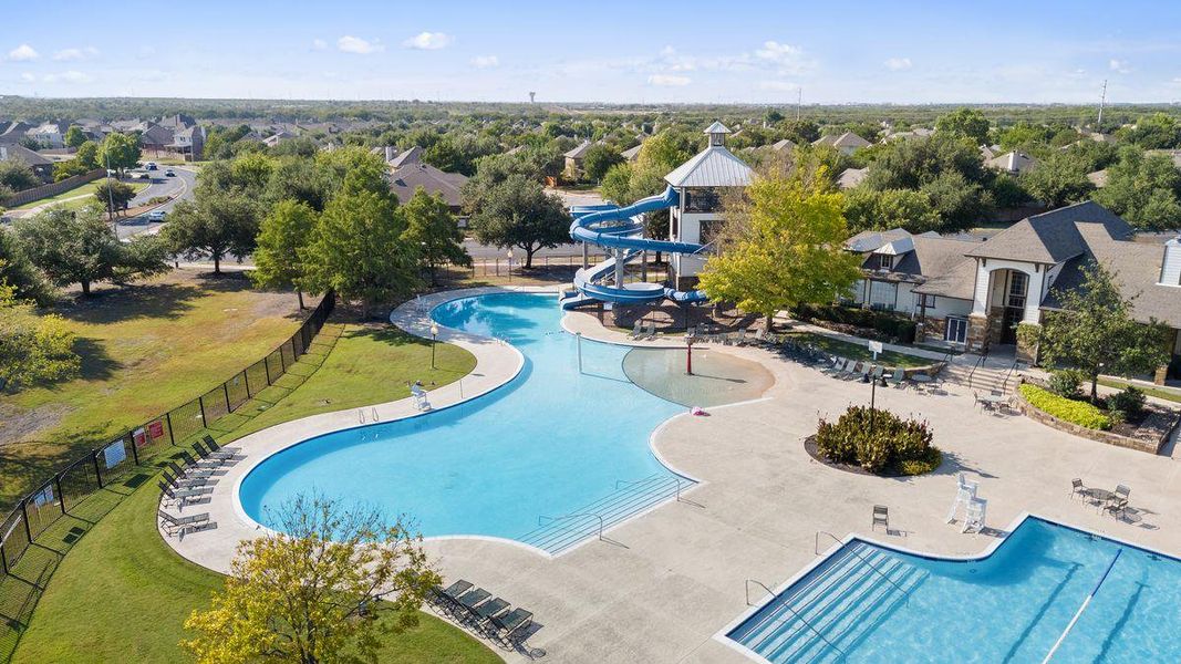 Enjoy the resort-style pool featuring a water slide and splash area for all ages. Enjoy the resort-style pool featuring a water slide and splash area for all ages.