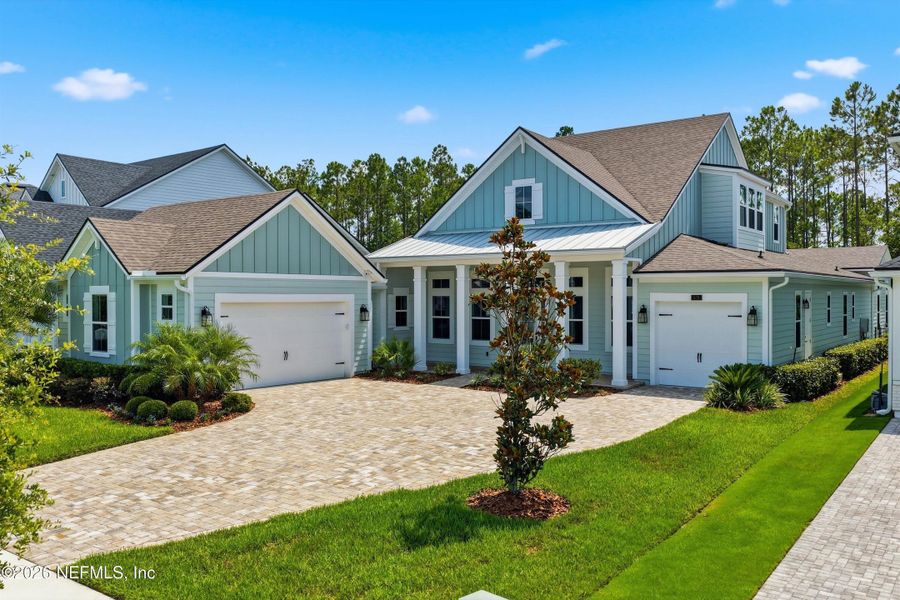 Front exterior of a new home in , Ponte Vedra, FL, highlighting curb appeal (Image 31). Front exterior of a new home in , Ponte Vedra, FL, highlighting curb appeal (Image 31).