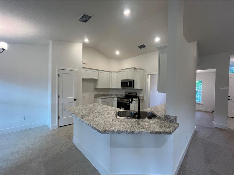 Furnished interior view inside a new home in Orange Blossom Hills, Summerfield (Image 6).