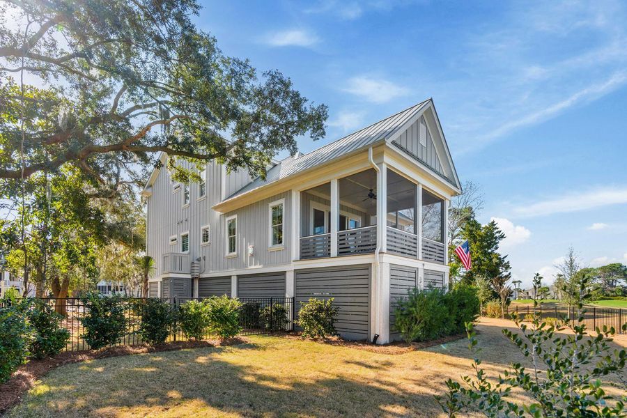 Exterior details and patio area of a home in , Johns Island (Image 31).