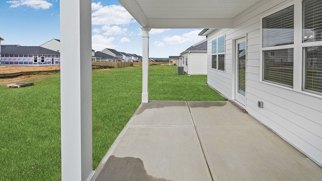 Exterior details and patio area of a home in Highland Hills, Graniteville (Image 2).