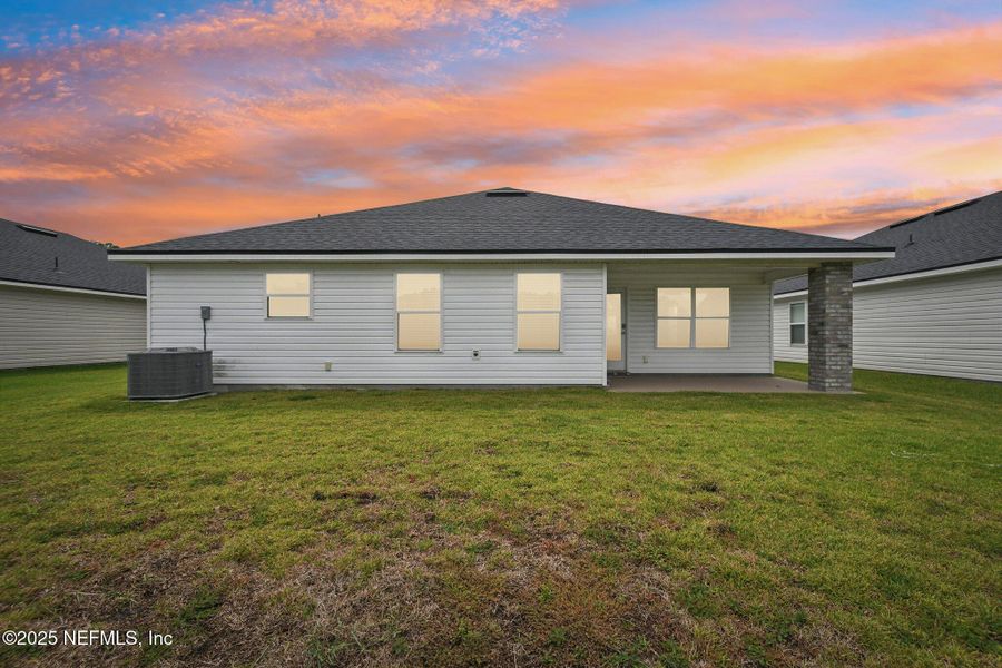 Front exterior of a new home in , Jacksonville, FL, highlighting curb appeal (Image 24). Front exterior of a new home in , Jacksonville, FL, highlighting curb appeal (Image 24).