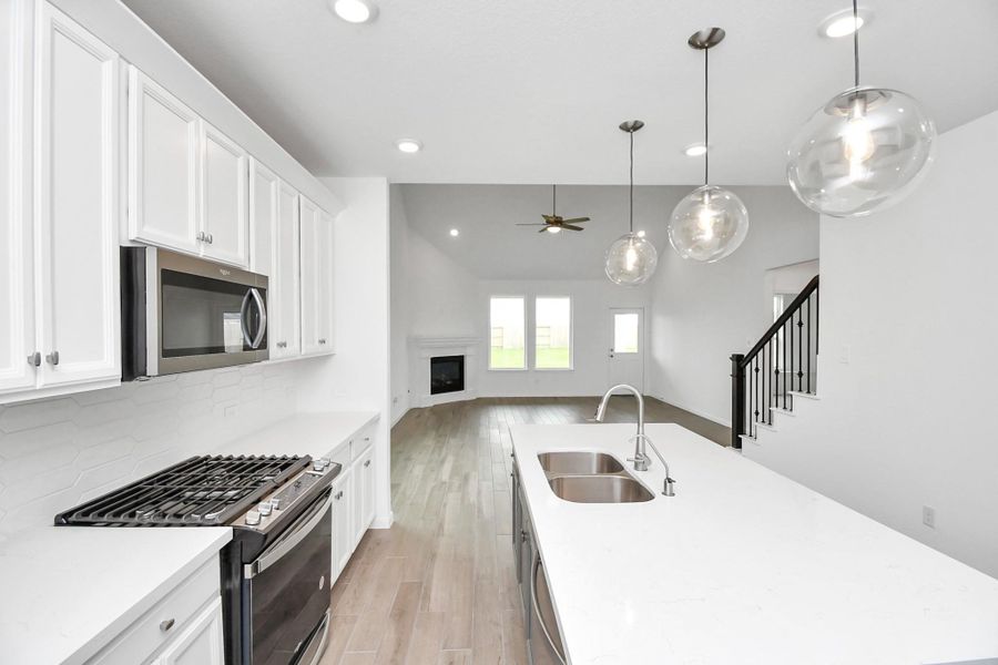 Furnished interior view inside a new home in Sunterra, Katy (Image 10).