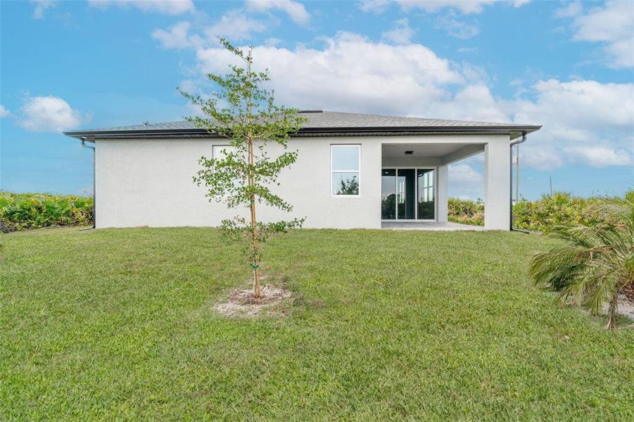 Exterior details and patio area of a home in , Rotonda West (Image 43).