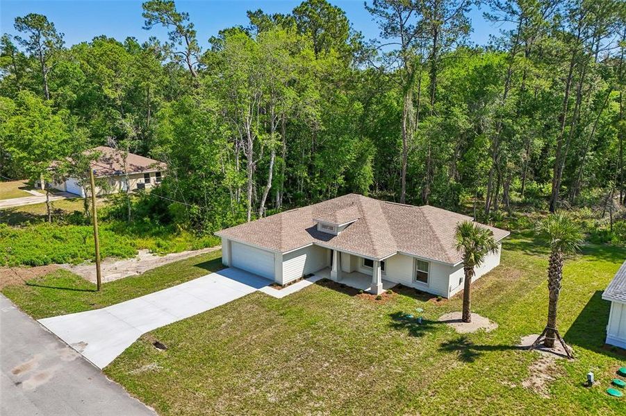 Front exterior of a new home in , Ocala, FL, highlighting curb appeal (Image 20).