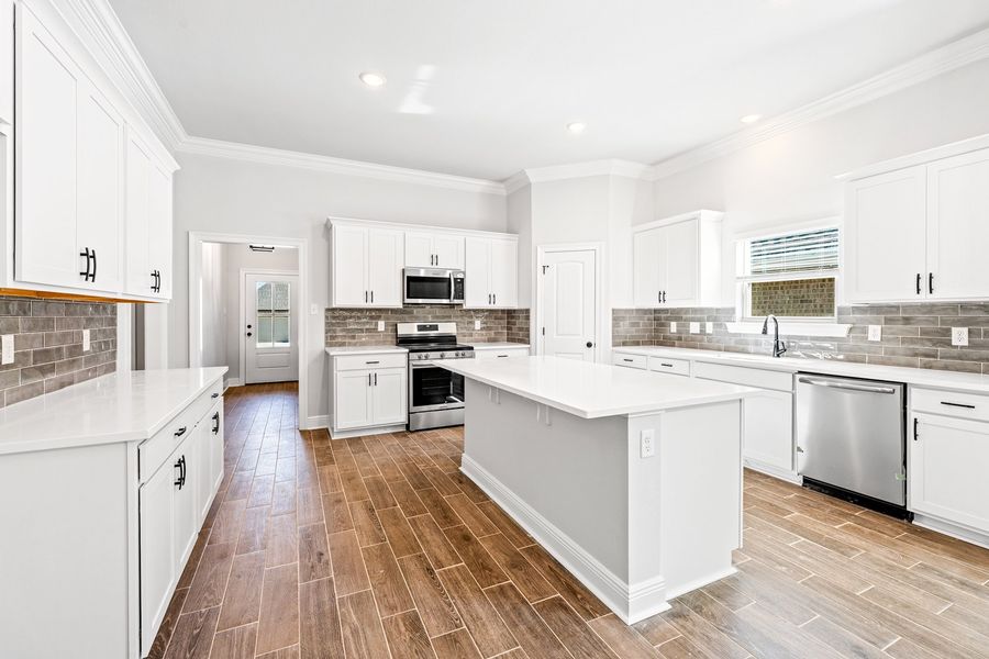 Furnished interior view inside a new home in Sentinel Ridge, Pace (Image 5).