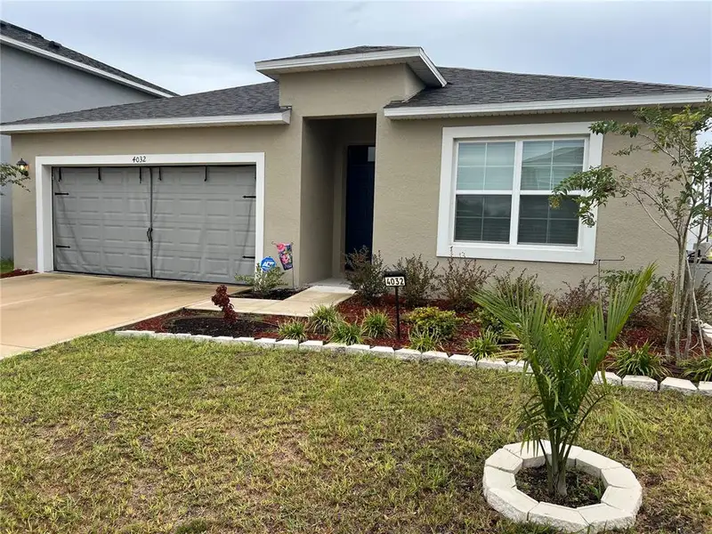 Front exterior of a new home in , Bartow, FL, highlighting curb appeal (Image 2). Front exterior of a new home in , Bartow, FL, highlighting curb appeal (Image 2).