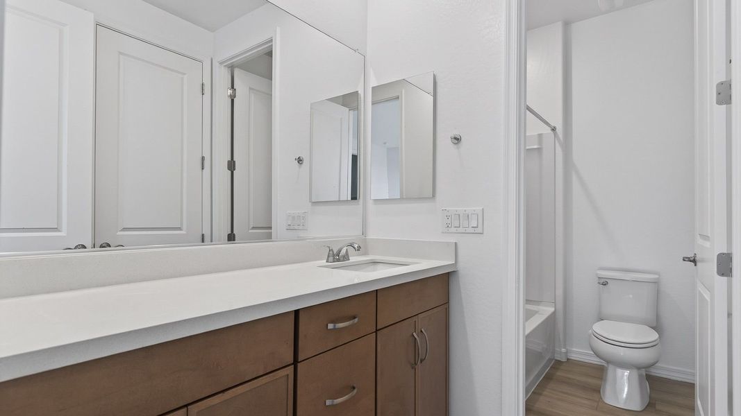 Furnished interior view inside a new home in The Grove at El Cidro, Goodyear (Image 10).