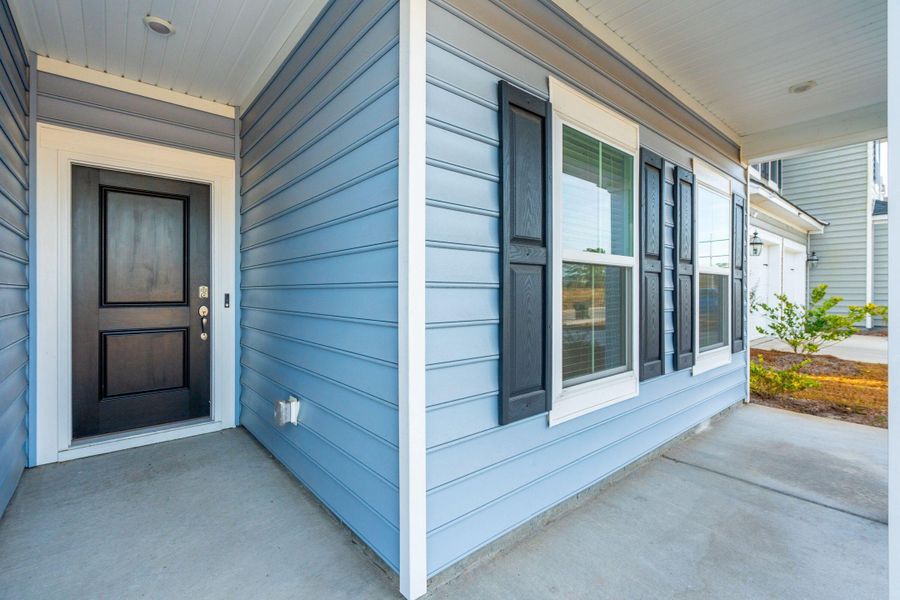 Exterior details and patio area of a home in Saint John's Lake: Arbor Collection, Johns Island (Image 4).