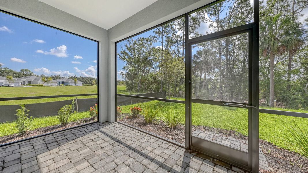 Exterior details and patio area of a home in Wildleaf Real Estate and Homes for Sale in Parrish, FL - Neal Communities, Parrish (Image 4). Exterior details and patio area of a home in Wildleaf Real Estate and Homes for Sale in Parrish, FL - Neal Communities, Parrish (Image 4).