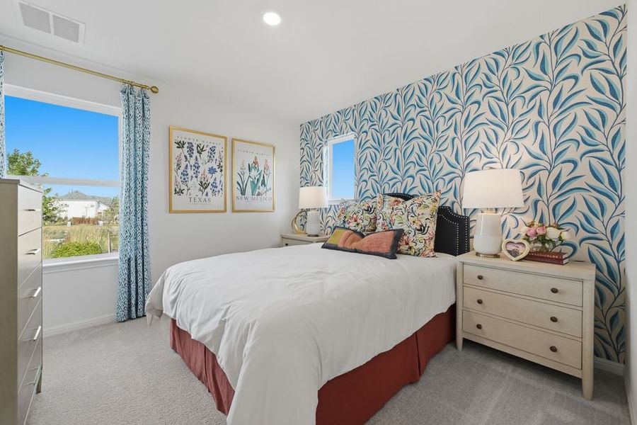 Representative furnished interior of a home built from the Hawk by Taylor Morrison in Longview 40s, Del Valle (Image 17).