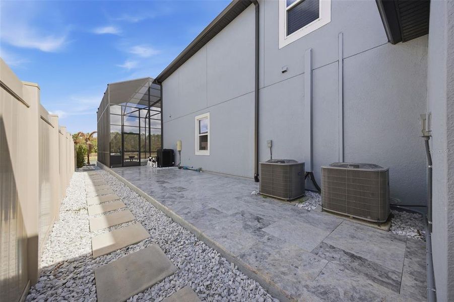 Exterior details and patio area of a home in Whispering Oaks Preserve, Wesley Chapel (Image 35). Exterior details and patio area of a home in Whispering Oaks Preserve, Wesley Chapel (Image 35).