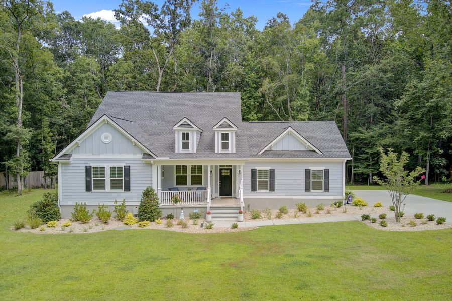 Front exterior of a new home in , Ridgeville, SC, highlighting curb appeal (Image 20). Front exterior of a new home in , Ridgeville, SC, highlighting curb appeal (Image 20).