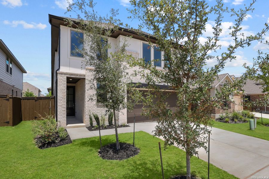 Front exterior of a new home in Stillwater Ranch, San Antonio, TX, highlighting curb appeal (Image 24).