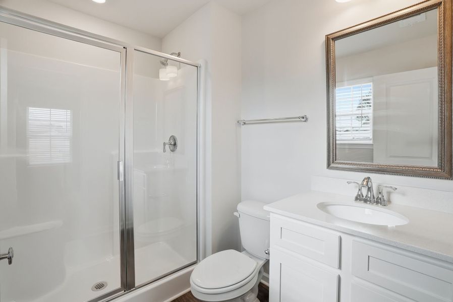 Representative furnished interior of a home built from the Juniper B by McGuinn Homes in Hunters Branch, Hopkins (Image 19).