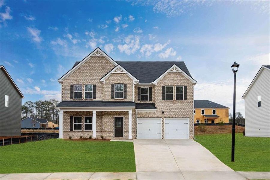Front exterior of a new home in Fern Dale, Fairburn, GA, highlighting curb appeal (Image 1). Front exterior of a new home in Fern Dale, Fairburn, GA, highlighting curb appeal (Image 1).