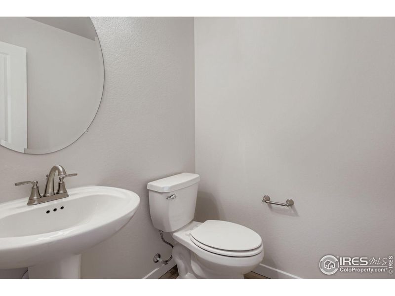 Furnished interior view inside a new home in RainDance National 60/70, Windsor (Image 10).