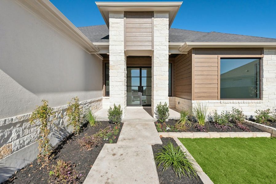 Exterior details and patio area of a home in Riverstone, Georgetown (Image 3).