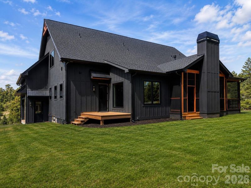 Private setting with usable yard space and outdoor living areas. Landscaping digitally enhanced.