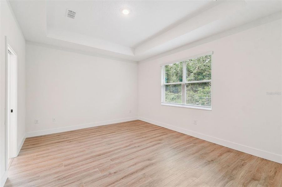 Spacious, unfurnished interior of a new home in Hidden Ridge, New Port Richey (Image 54).